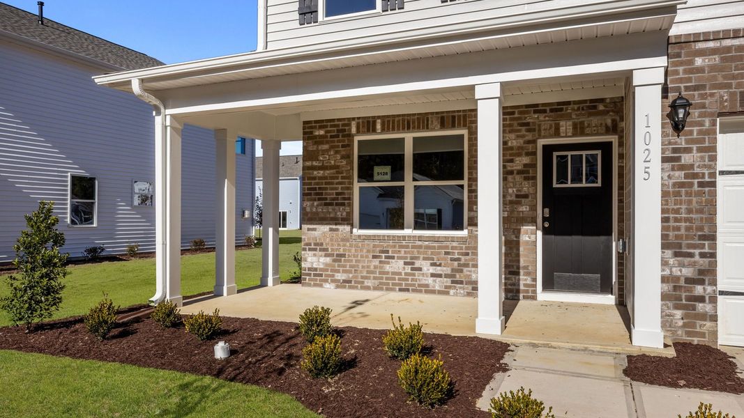 Exterior details and patio area of a home in West New Bern, New Bern (Image 4).