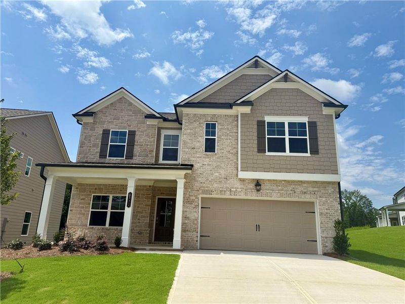 Front exterior of a new home in Ponderosa Farms Estates, Gainesville, GA, highlighting curb appeal (Image 39).