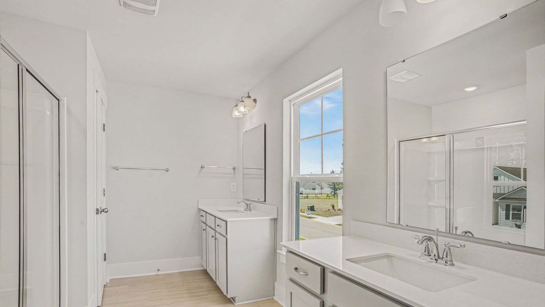 Representative furnished interior of a home built from the Mackenzie2 by D.R. Horton in Chapman Village, Conway (Image 5).