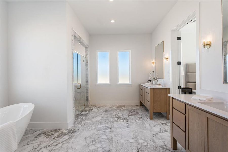 Bathroom with vanity and independent shower and bath