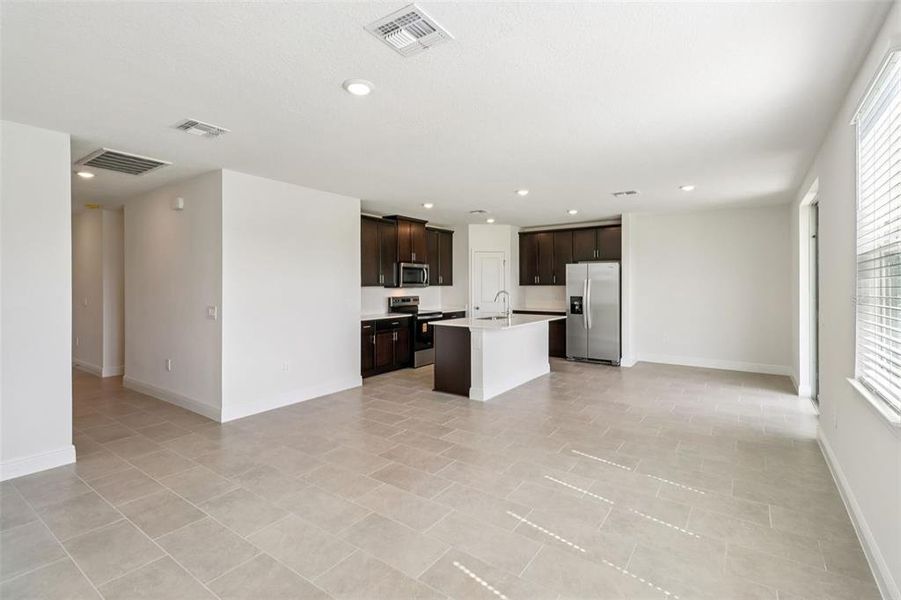Spacious, unfurnished interior of a new home in The Reserve at Hammock Oaks - Classic Series, Lady Lake (Image 17).