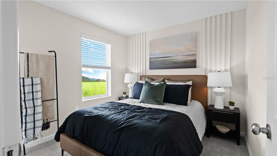 Furnished interior view inside a new home in Wellness Ridge, Clermont (Image 21).