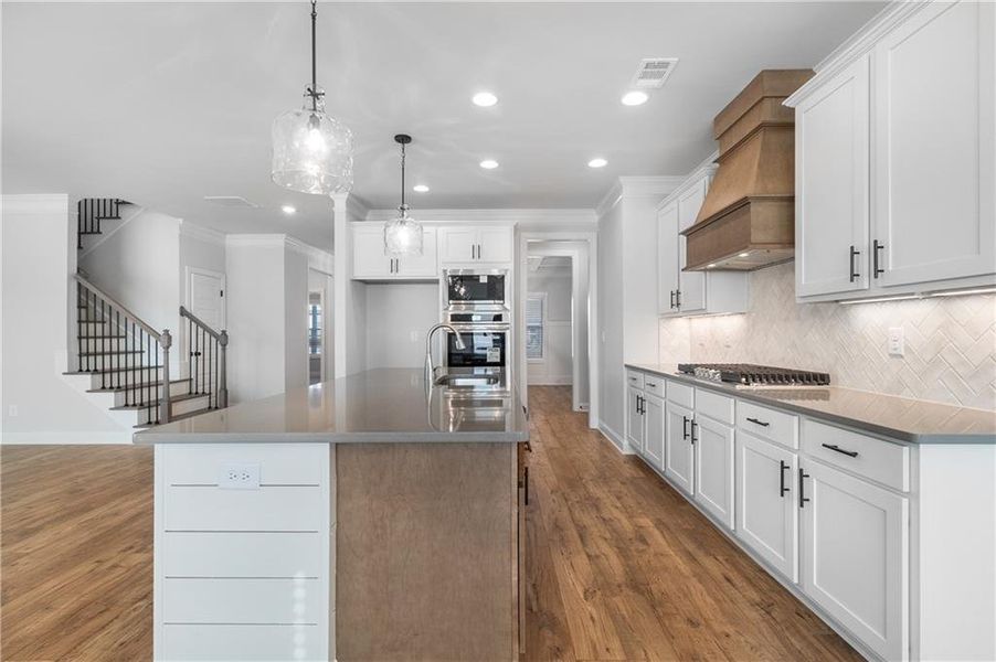 Furnished interior view inside a new home in Calgary Downs, Winder (Image 5).
