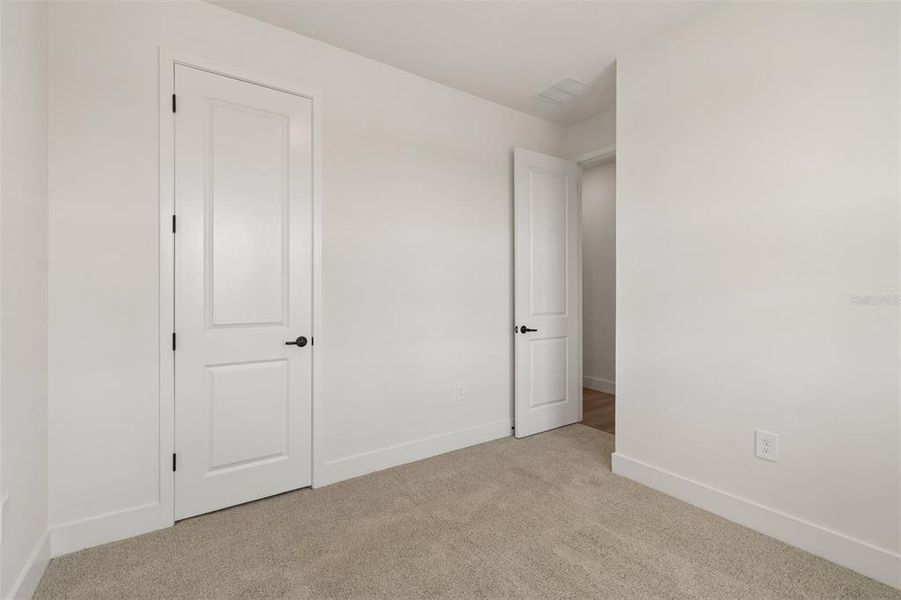 Spacious, unfurnished interior of a new home in Gracewater at Sarasota, Sarasota (Image 30).
