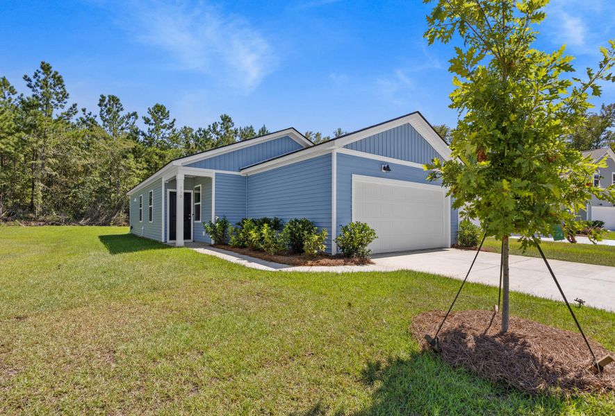 Front exterior of a new home in Bradford Pointe, Summerville, SC, highlighting curb appeal (Image 2).