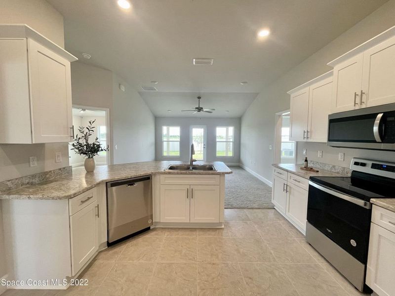 Representative furnished interior of a home built from the 1485 by Adams Homes in Winding Oaks, Weeki Wachee (Image 6). Representative furnished interior of a home built from the 1485 by Adams Homes in Winding Oaks, Weeki Wachee (Image 6).
