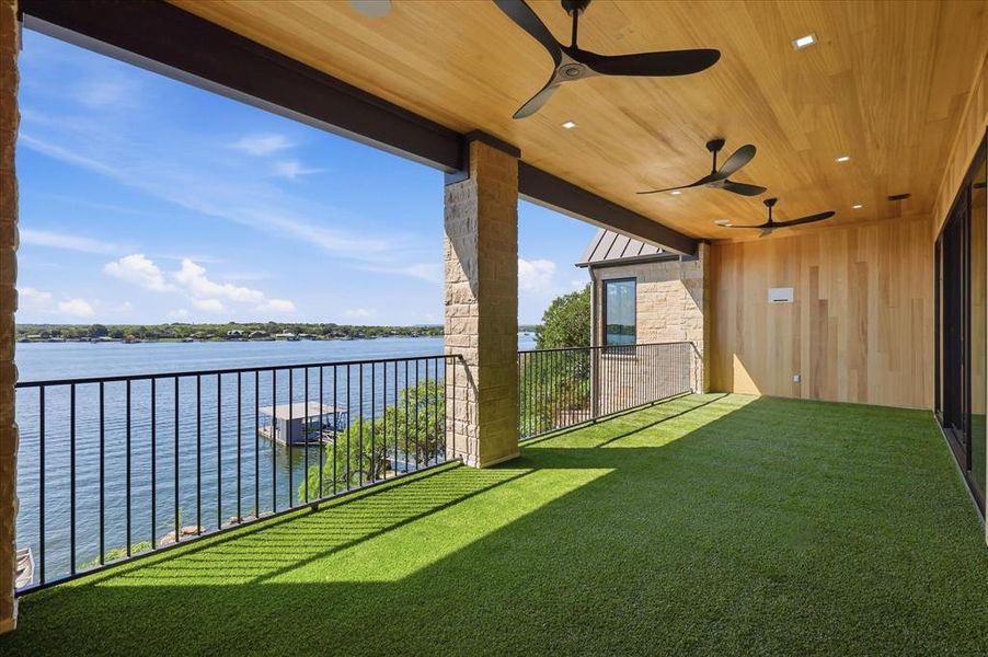 Exterior details and patio area of a home in , Graford (Image 20).