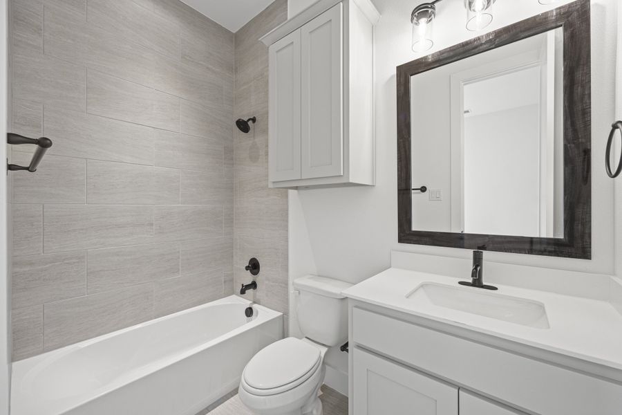 Furnished interior view inside a new home in Winding Creek, Rockwall (Image 28).