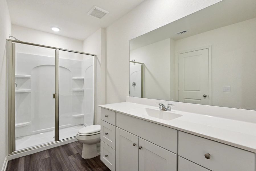Representative furnished interior of a home built from the Compass by Starlight Homes in The Wilder, Adkins (Image 12).
