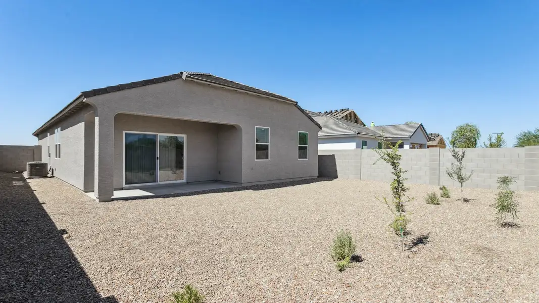 Exterior details and patio area of a home in Del Rio Ranch, Avondale (Image 2).
