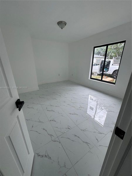 Spacious, unfurnished interior of a new home in , Miami (Image 5). Spacious, unfurnished interior of a new home in , Miami (Image 5).