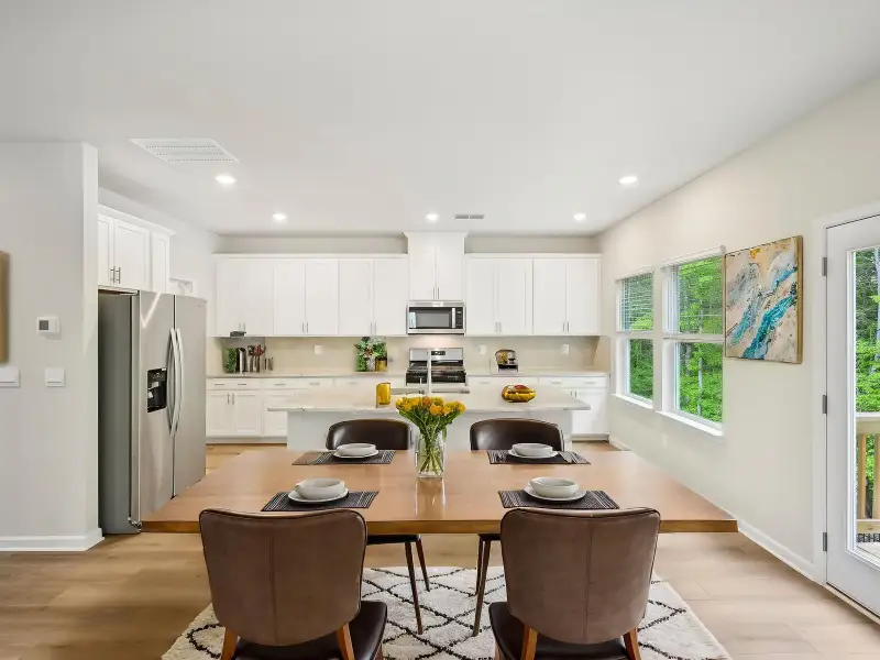 Furnished interior view inside a new home in Martin Springs - Estate Series, Lawrenceville (Image 4).