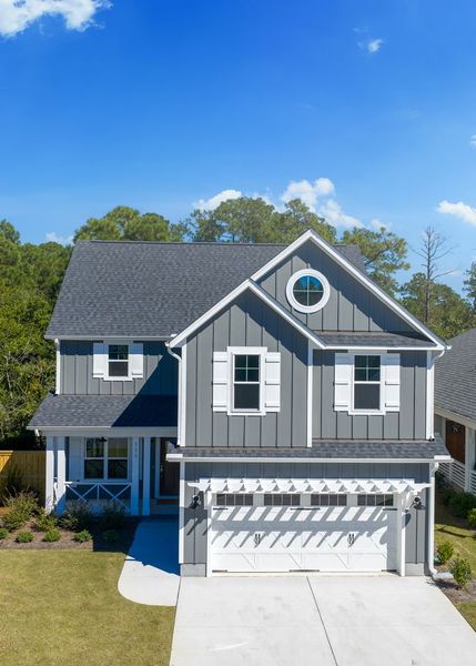 Front exterior of a new home in Carolina Creek, Hampstead, NC, highlighting curb appeal (Image 2).