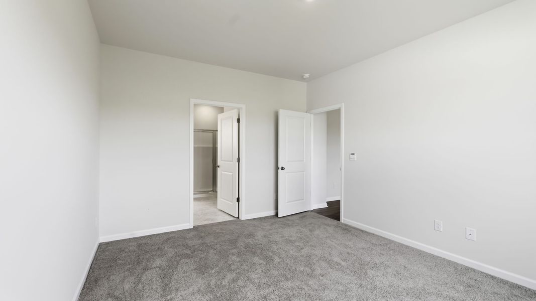 Spacious, unfurnished interior of a new home in Tap Root Farms, Fletcher (Image 26).