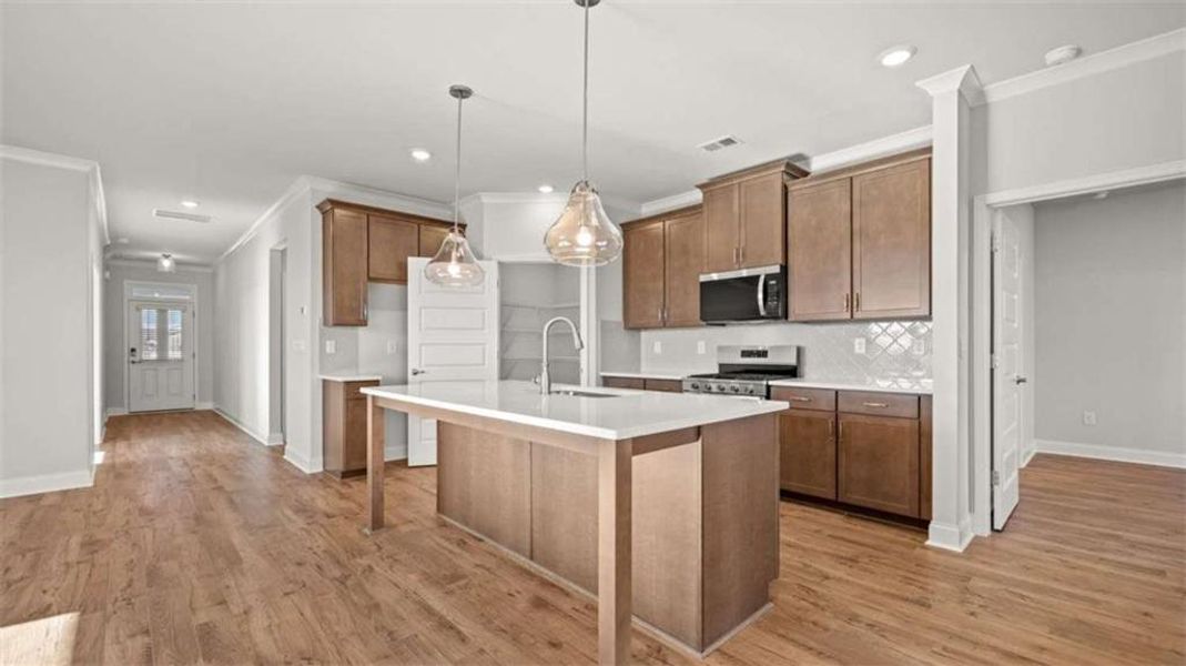 Furnished interior view inside a new home in Oak Ridge Meadows - Active Adult, Locust Grove (Image 16).