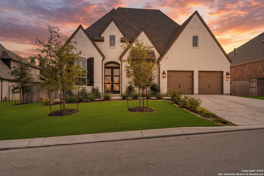 Front exterior of a new home in Front Gate in Fair Oaks Ranch, Fair Oaks Ranch, TX, highlighting curb appeal (Image 2). Front exterior of a new home in Front Gate in Fair Oaks Ranch, Fair Oaks Ranch, TX, highlighting curb appeal (Image 2).