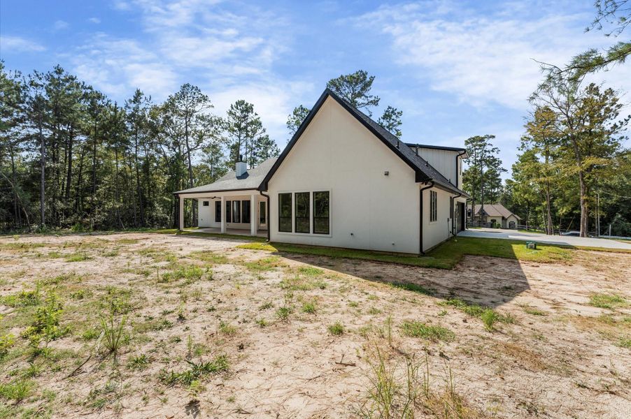 A full acre of wooded serenity with endless potential—space for gatherings, outdoor living, or future additions. A full acre of wooded serenity with endless potential—space for gatherings, outdoor living, or future additions.