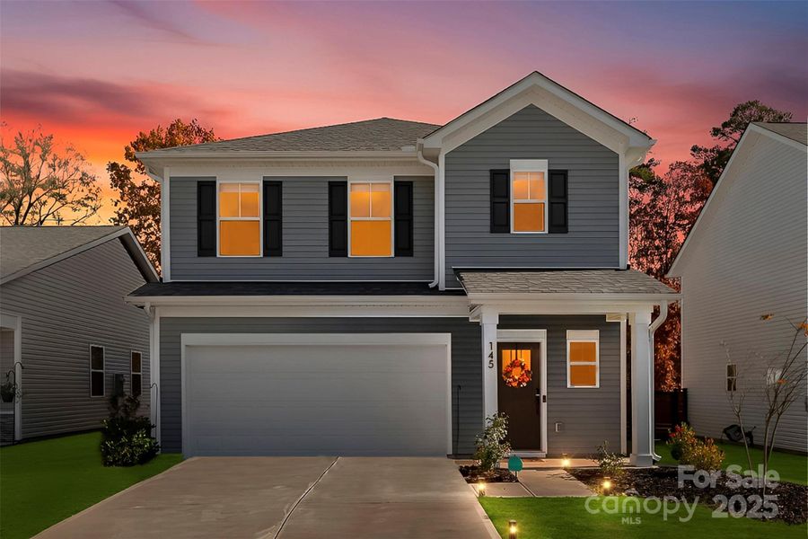 Front exterior of a new home in Surrey Woods, Charlotte, NC, highlighting curb appeal (Image 1).