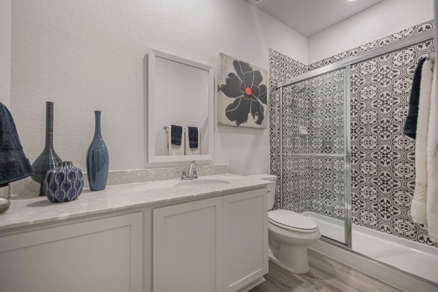 Representative furnished interior of a home built from the Brandy by Chesmar Homes in Buffalo Crossing, Cibolo (Image 18).