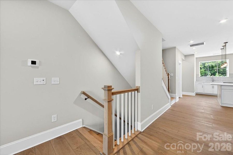 Second floor landing with open rails Second floor landing with open rails