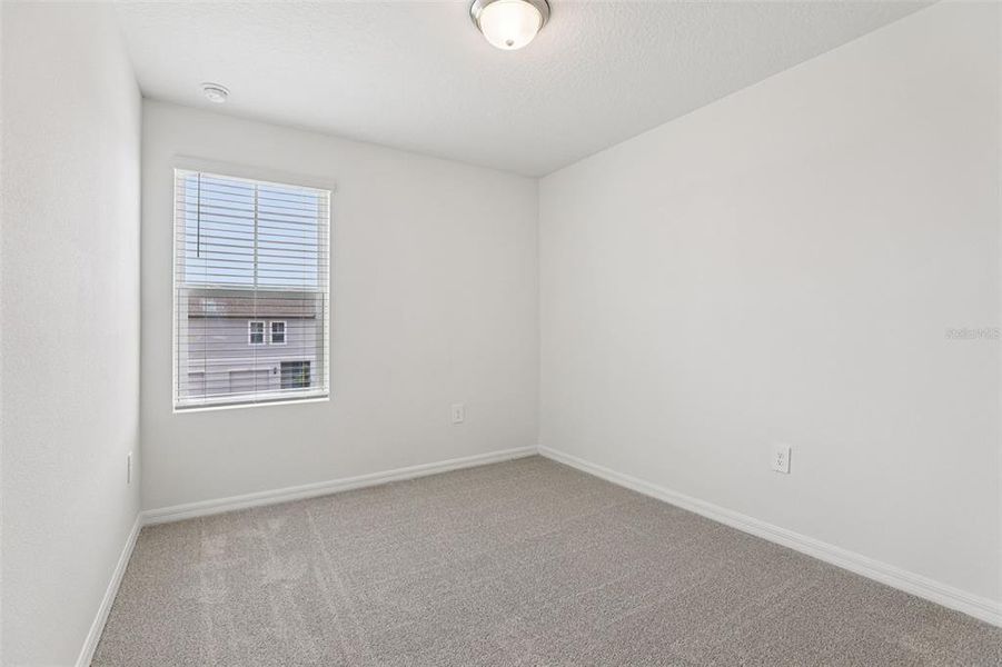Spacious, unfurnished interior of a new home in Cagan Crossings West, Clermont (Image 19).