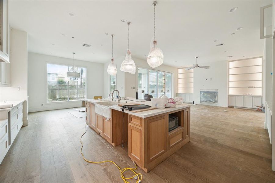 View from the Kitchen towards the Family Room and Breakfast Area.