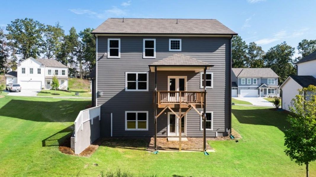 Exterior details and patio area of a home in Falcon Landing, Gainesville (Image 17).