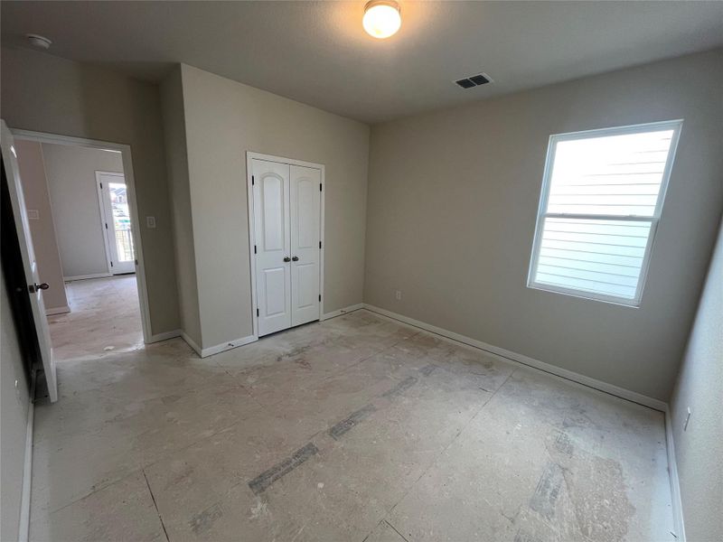 In-progress construction of a new home in The Cottages at Lariat, Liberty Hill, TX (Image 33).