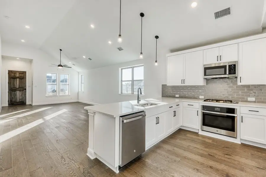 Furnished interior view inside a new home in The Porch at Du Pre, Buda (Image 4).