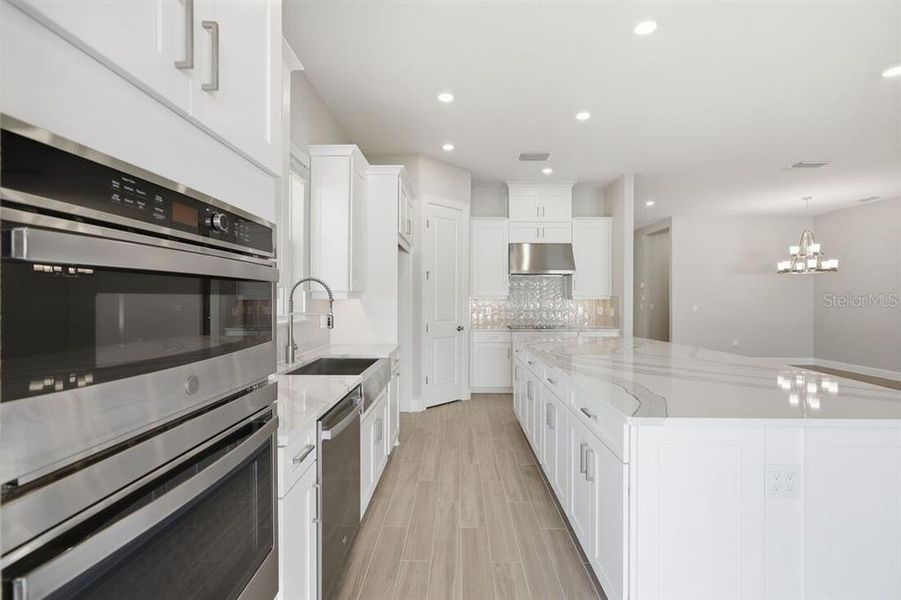 Furnished interior view inside a new home in Esplanade at Westview, Kissimmee (Image 14).