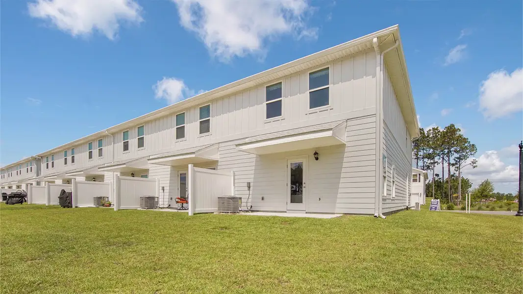 Exterior details and patio area of a home in Bayside at Ward Creek, Panama City Beach (Image 3).
