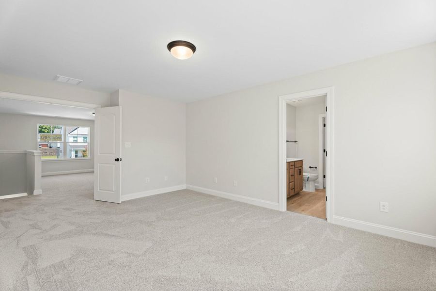 Spacious, unfurnished interior of a new home in Cottages at Piper Village, Trinity (Image 25).