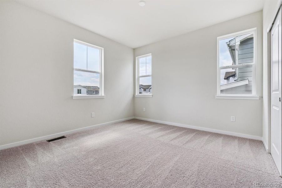 Spacious, unfurnished interior of a new home in Floret Collection at Parkdale Commons, Lafayette (Image 22).