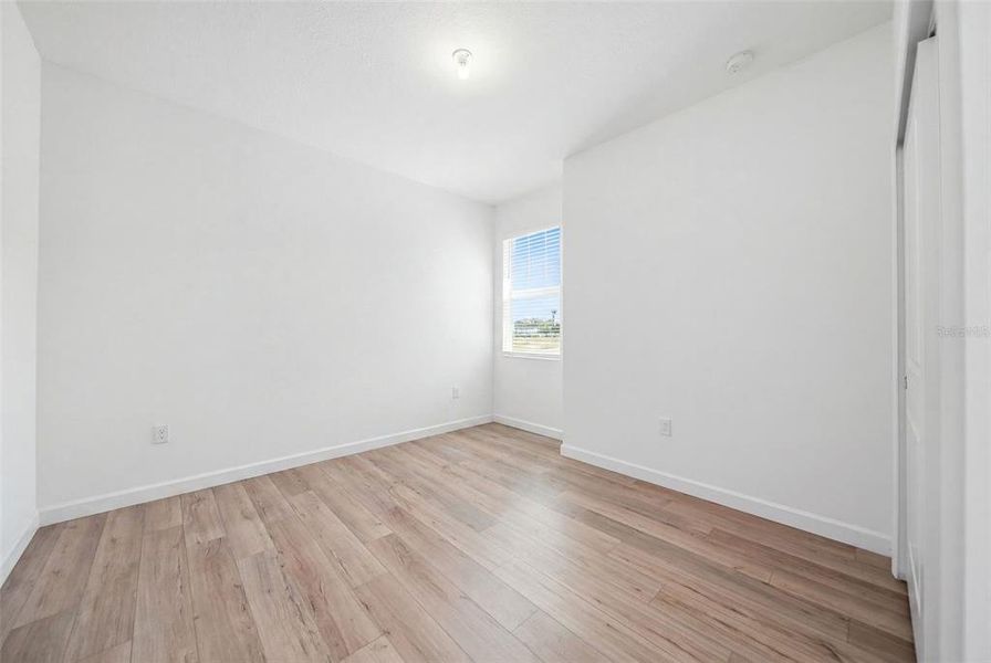 Spacious, unfurnished interior of a new home in The Timbers at Everlands, Palm Bay (Image 38).