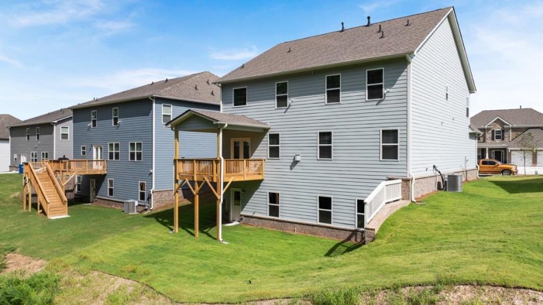 Front exterior of a new home in Butner Estates, South Fulton, GA, highlighting curb appeal (Image 8).