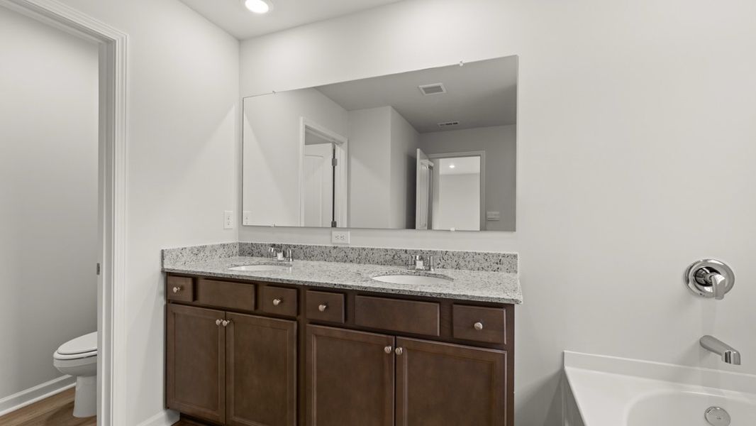 Representative furnished interior of a home built from the Green by D.R. Horton in Aurora Creek, Dallas (Image 8).