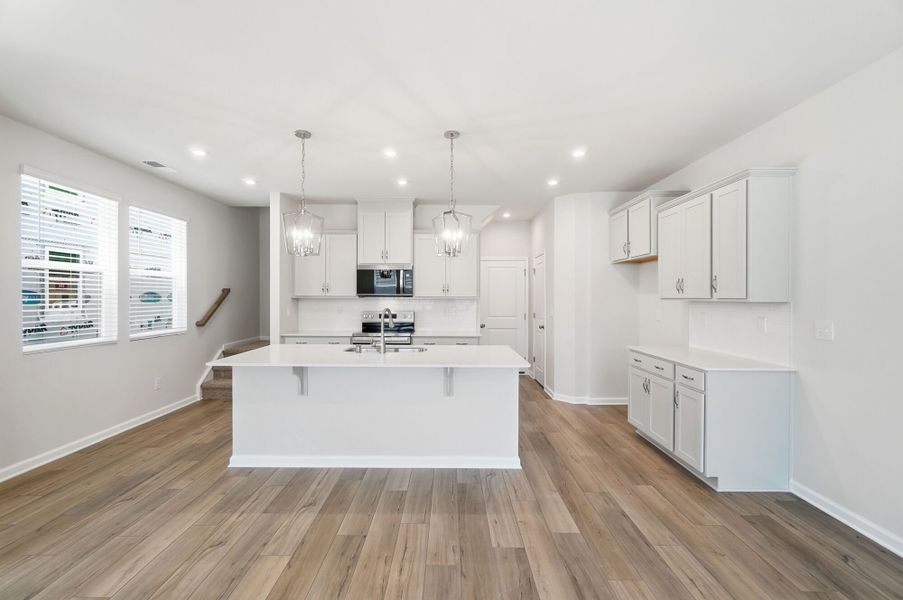 Furnished interior view inside a new home in Stonesummit at Reedy Creek, Charlotte (Image 6).
