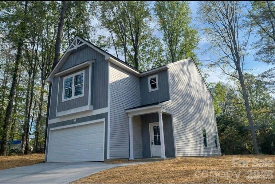 Front exterior of a new home in , Morganton, NC, highlighting curb appeal (Image 1). Front exterior of a new home in , Morganton, NC, highlighting curb appeal (Image 1).