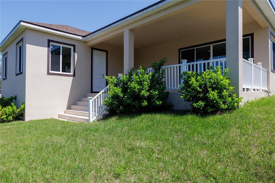 Exterior details and patio area of a home in , Palm Coast (Image 23).