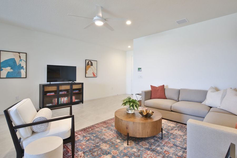 Representative furnished interior of a home built from the Morgan by Neal Communities in SkySail, Naples (Image 29).
