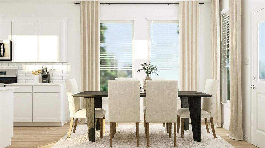 Dining room featuring light hardwood / wood-style flooring