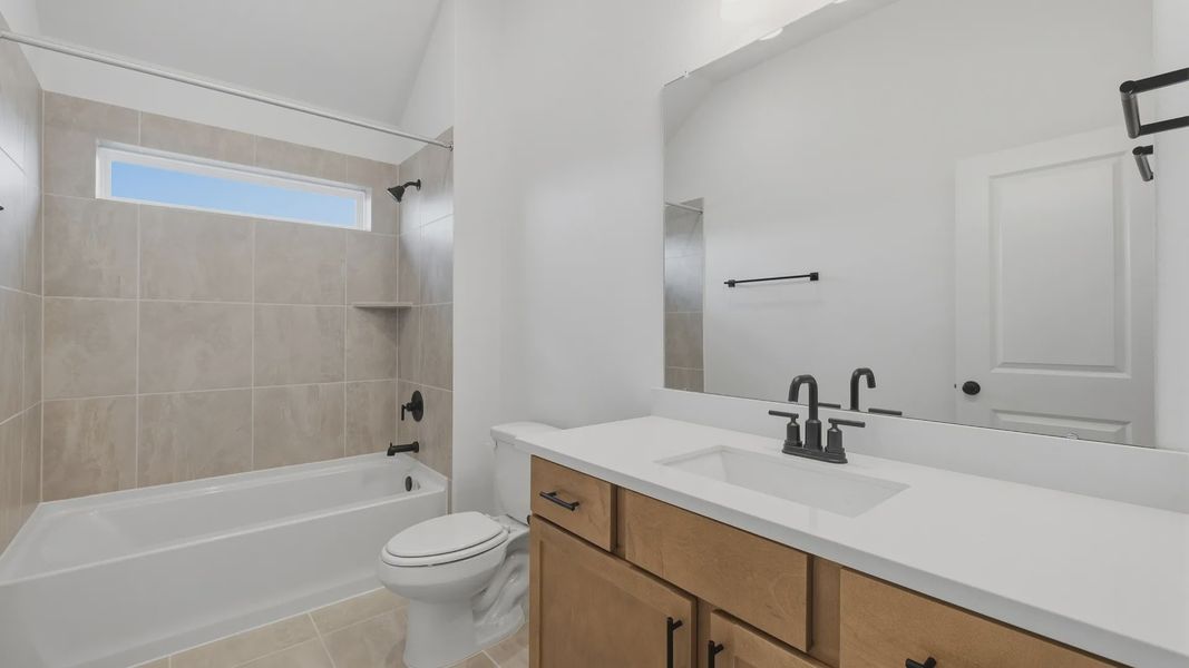 Furnished interior view inside a new home in Grand Magnolia, Magnolia (Image 25).