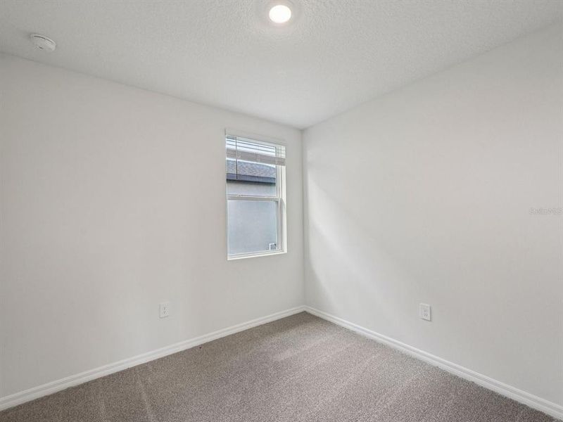 Spacious, unfurnished interior of a new home in Magnolia Bay - Premier Series, Nokomis (Image 17).