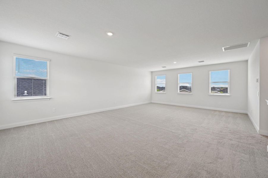 Spacious, unfurnished interior of a new home in Brystol at Wylder - Reserve Series, Port St. Lucie (Image 12).