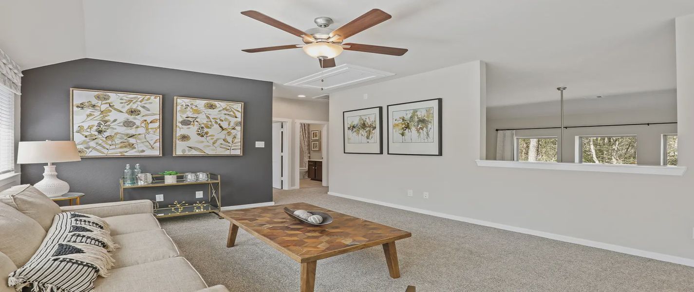 Representative furnished interior of a home built from the Durham by Chesmar Homes in The Woodlands Hills, Willis (Image 10).