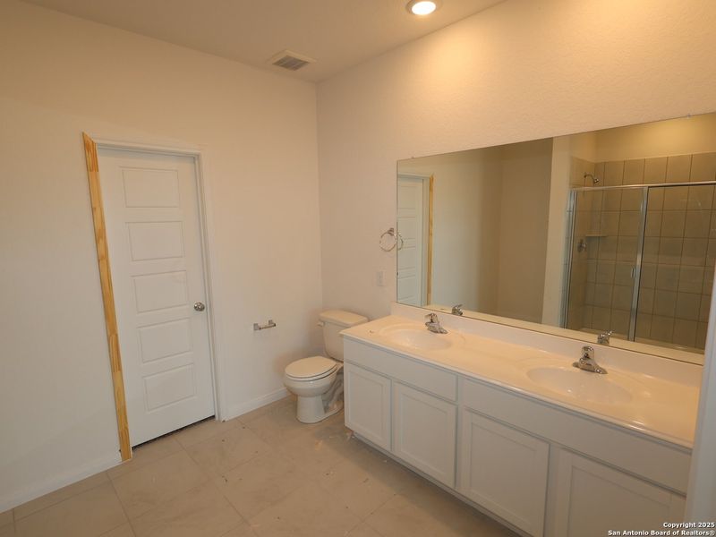 Furnished interior view inside a new home in Agave, San Antonio (Image 9).