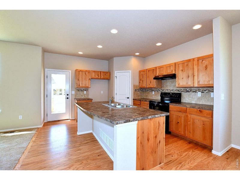 Furnished interior view inside a new home in Union Colony West, Greeley (Image 11).