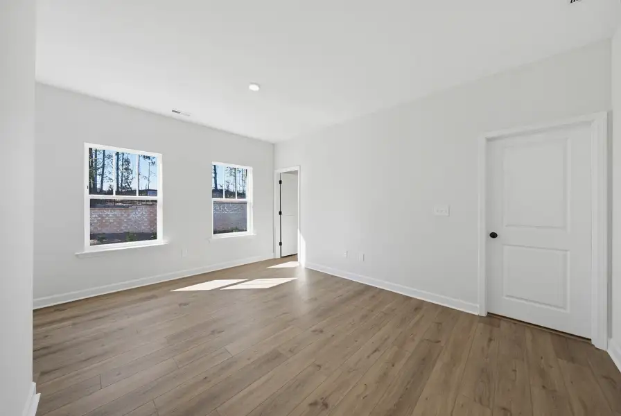 Spacious, unfurnished interior of a new home in Sweetbrier, Durham (Image 25).