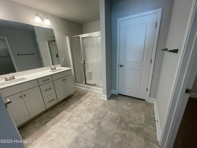 Furnished interior view inside a new home in Mill Creek Cove, Bolivia (Image 7).