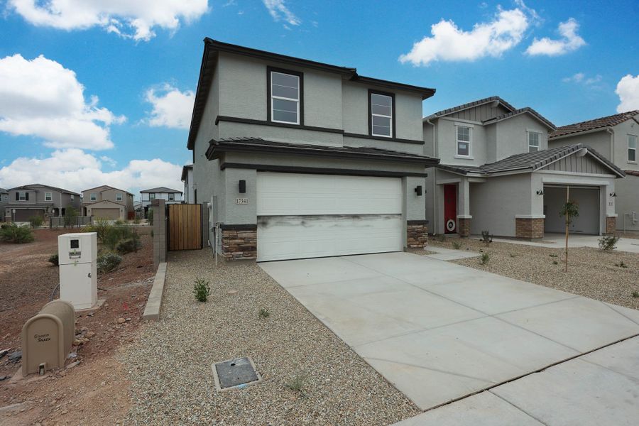 A house with a garage. A house with a garage.